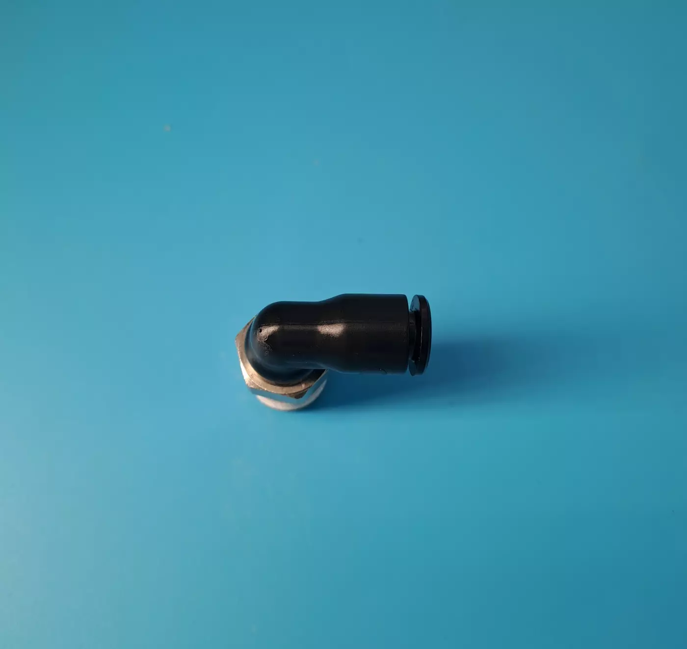 Raccord  pneumatique coudé instantané techno polymère mâle orientable BSP conique T8-R3/8"